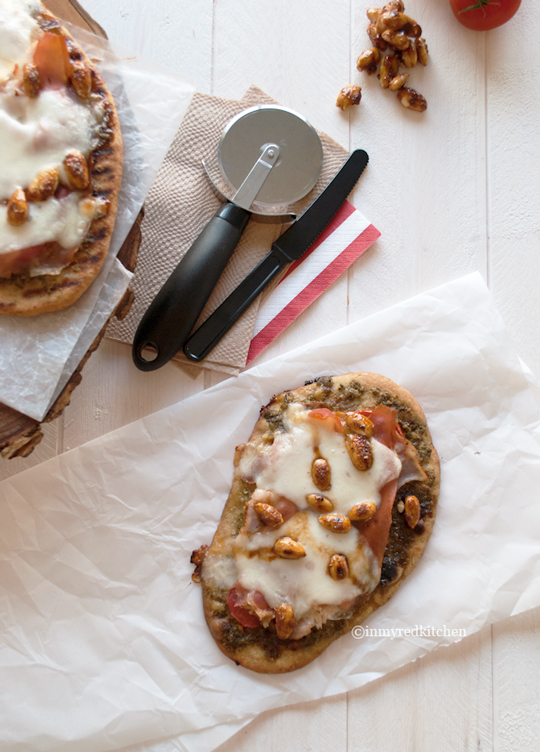 Naan pesto pizza with prosciutto and turkey