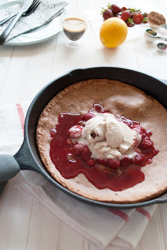 Chocolate Dutch baby pancake with strawberries