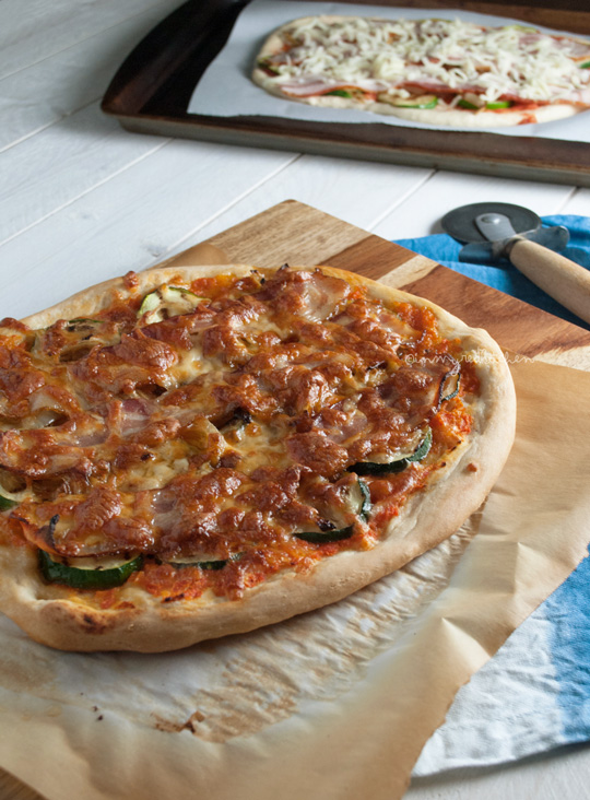 Bacon and zucchini pizza