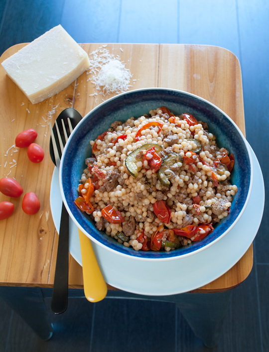 Israeli couscous with tomatoes and zucchini